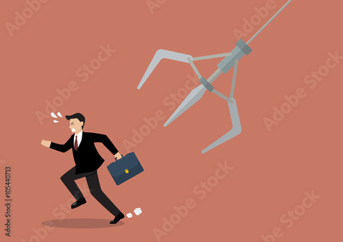 Businessman running away from robotic claw