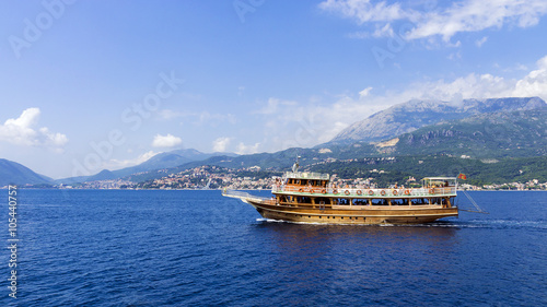 walking tourist ship off the coast of Montenegro © dimbar76