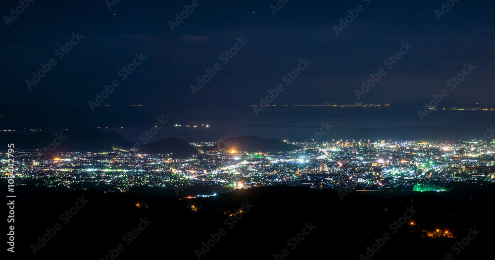 Naklejka premium Aerial view of night scene of city. Cityscape of Hakone city in Japan, Asia.