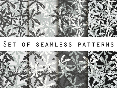 Palm trees, leaves of palm tree. Seamless patterns. The pattern for wallpaper, bed linen, tiles, fabrics, backgrounds. Vector illustration.