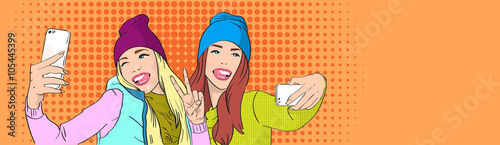 Two Girls Taking Selfie Smart Phone Photo Wear Winter Hat Pop Art Colorful Retro Style