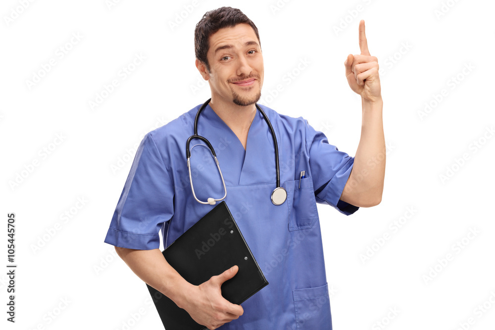 Cheerful doctor pointing up with his finger Cheerful doctor pointing up with his finger