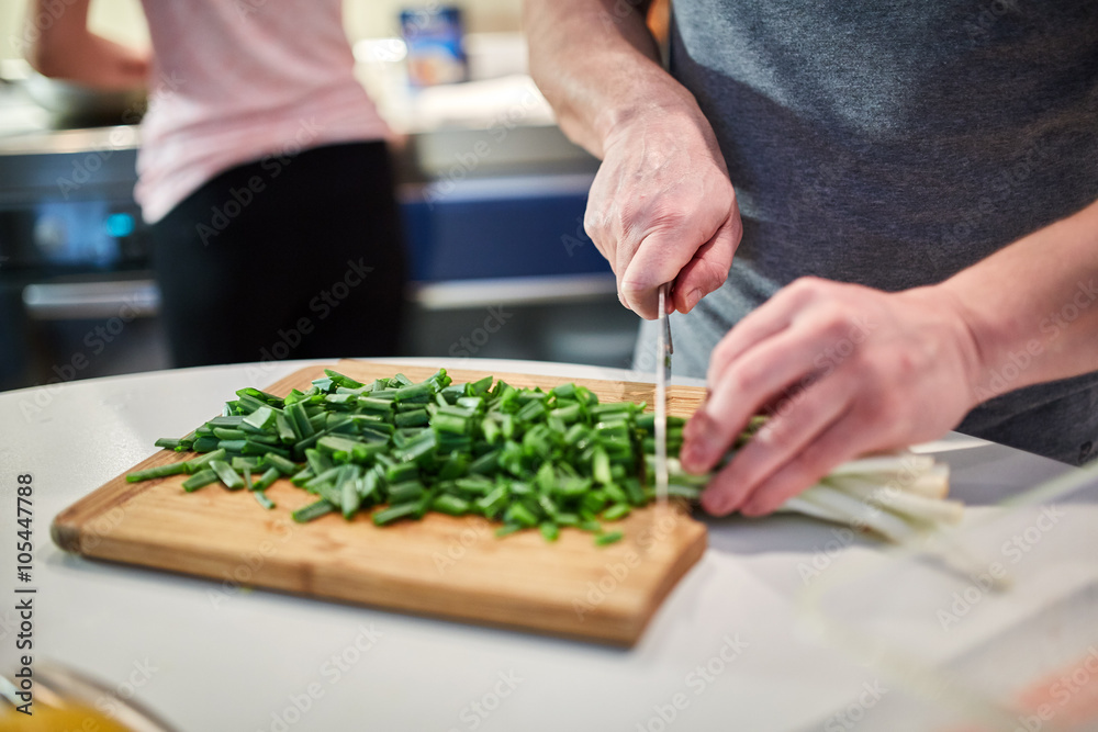 Couple cooking at home