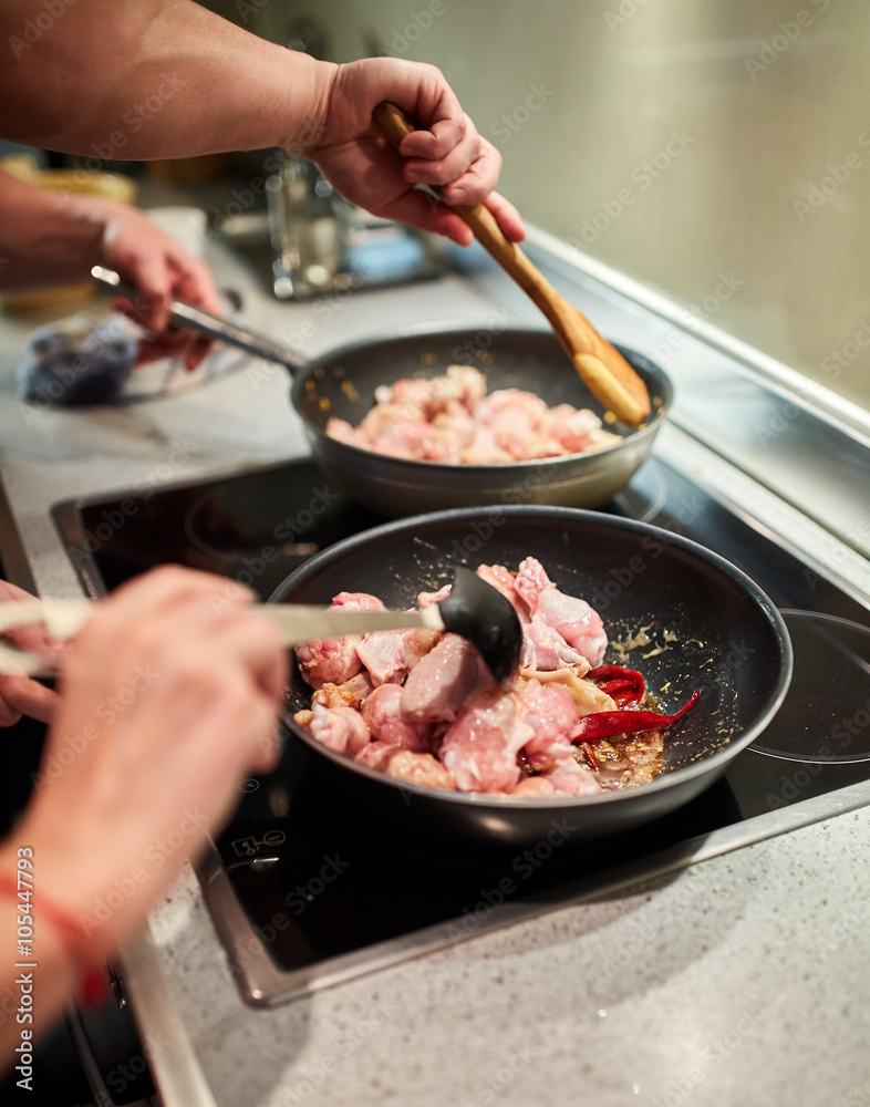 Couple cooking together Couple cooking together