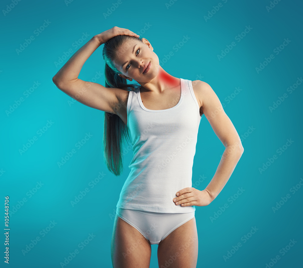 Young woman exercising neck, stretching left side of her body. Concept