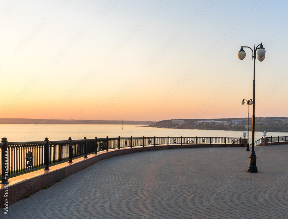 On the embankment of the Izhevsk pond in the evening before sunset