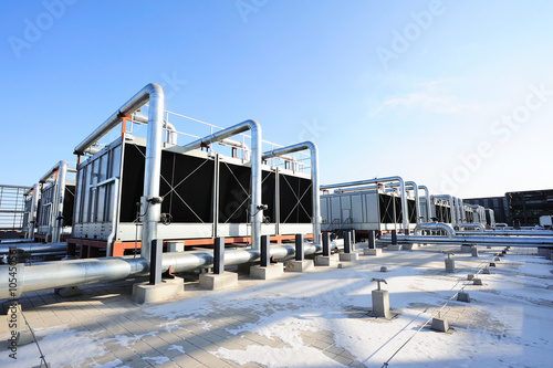 Sets of cooling towers in data center building.