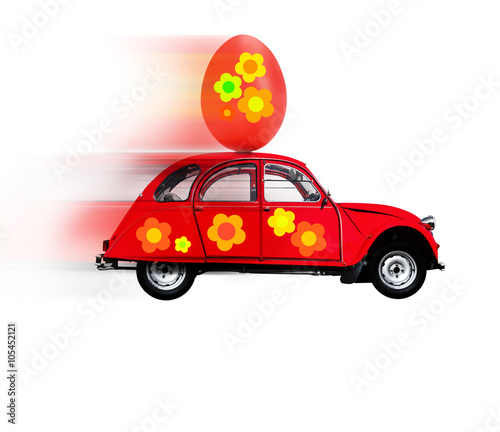 Rotes Auto mit Osterei