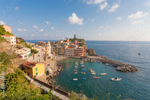 Scenic view of ocean and harbor in colorful village Vernazza, Ci