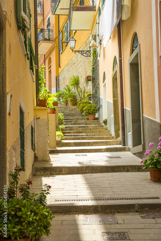 Riomaggiore (Rimazuu), a village in province of La Spezia, Liguria, Italy. It's one of the lands of Cinque Terre, UNESCO World Heritage Site Riomaggiore (Rimazuu), a village in province of La Spezia, Liguria, Italy. It's one of the lands of Cinque Terre, UNESCO World Heritage Site