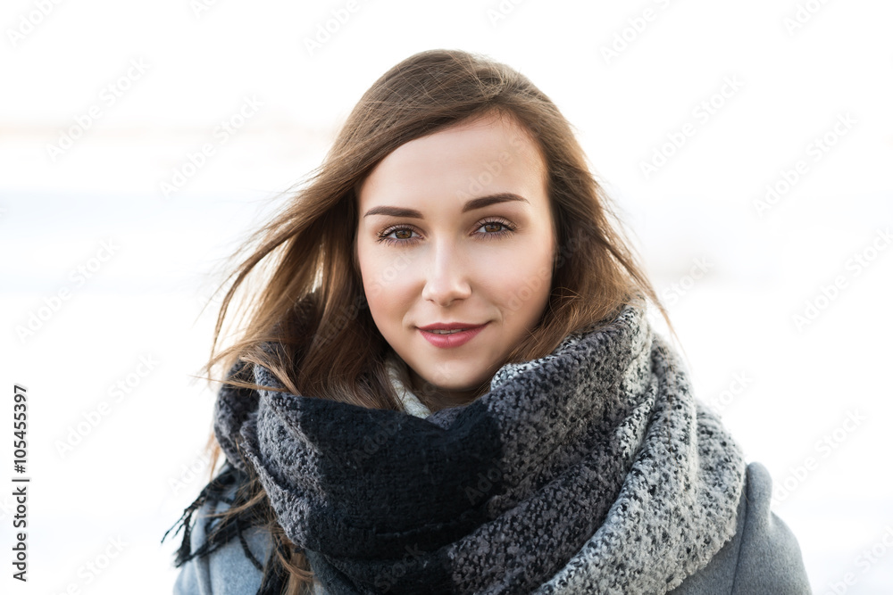 Beautiful girl in winter park