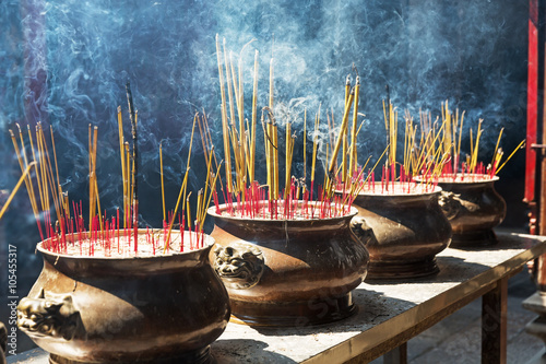 burning of red candle at chinese temple