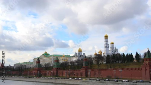 4k Red brick walls of famous Kremlin and Ivan Great Bell Tower in Moscow, Russia. Sunny day. Time Lapse