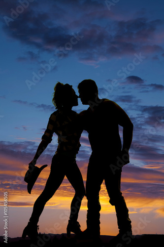 silhouette of man and woman close together