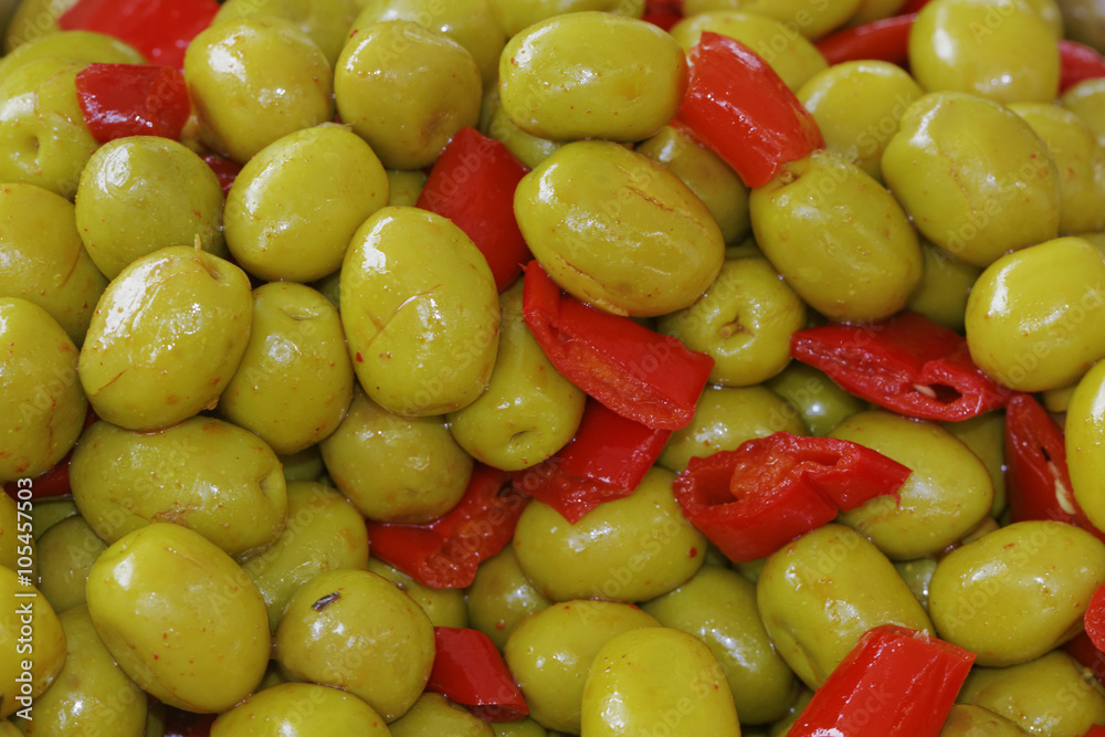 Green olives with sweet pepper, bell pepper (Capsicum annuum), Corsica, France Green olives with sweet pepper, bell pepper (Capsicum annuum), Corsica, France