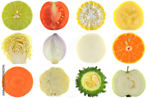 Halves of crop, fruits and vegetables on white background photo