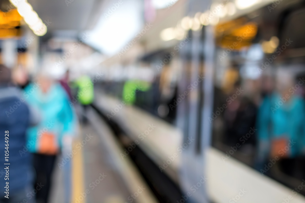 Train At Platform & People. Soft Focus. Railway Station Background. Train At Platform & People. Soft Focus. Railway Station Background.