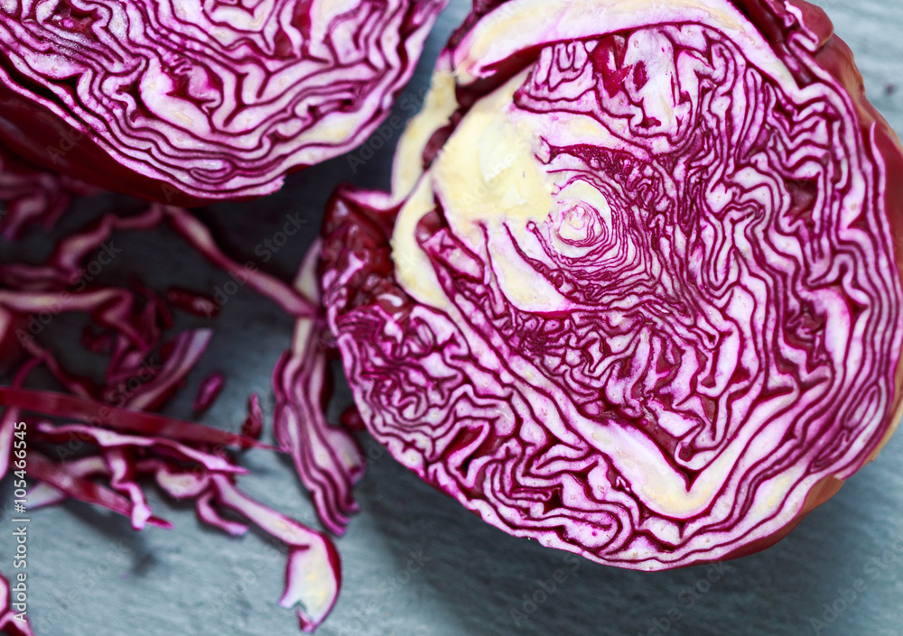 Obraz premium Fresh organic red cabbage on the black Board