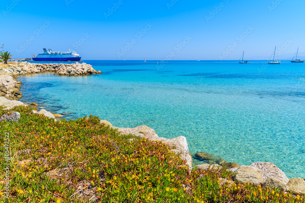 Azure sea bay in Ile Rousse coastal town, Corsica island, France