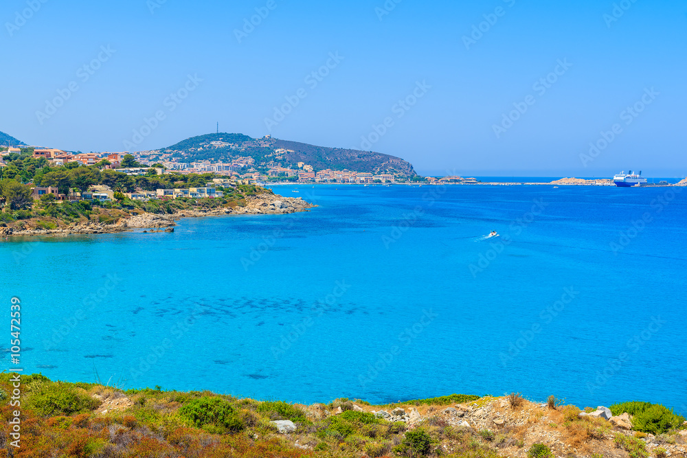 Azure sea bay and view of Ile Rousse coastal town, Corsica island, France