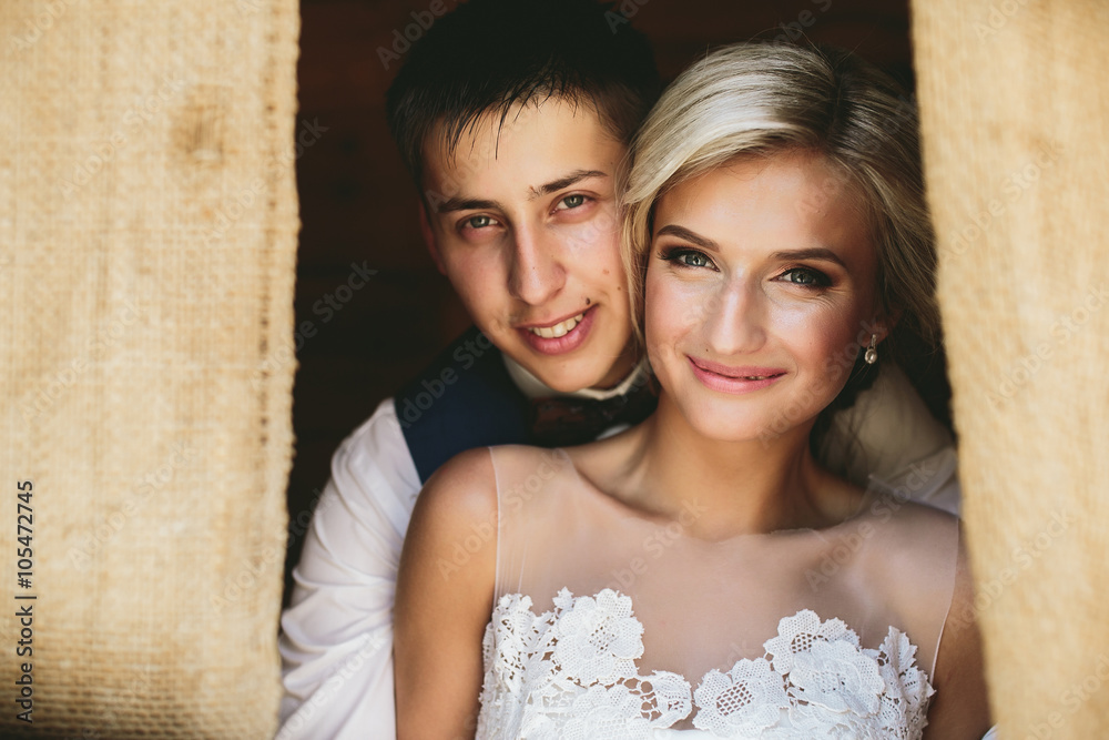 Beautiful wedding couple in doorway Beautiful wedding couple in doorway
