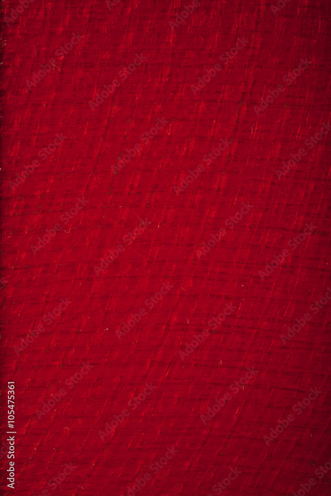 Fototapeta premium red carbon fiber texture, closeup view