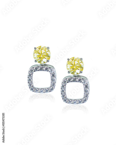 Yellow diamond citrine topaz stud earrings pair isolated on white
