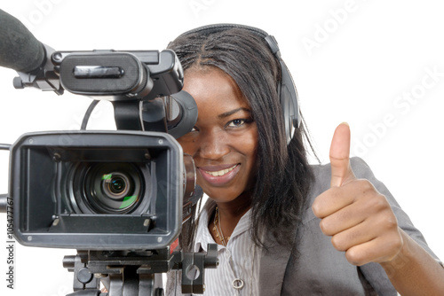 Photos young African American woman with professional video camera