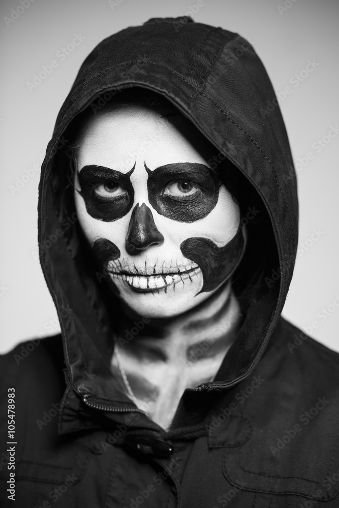 Woman painted like a corpse