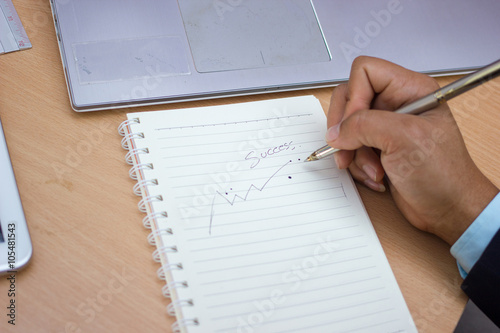 Businessman write success,Success concept write down in a paper