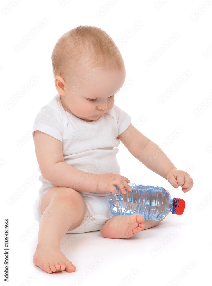 Infant child baby girl sitting with big bottle of drinking water Infant child baby girl sitting with big bottle of drinking water