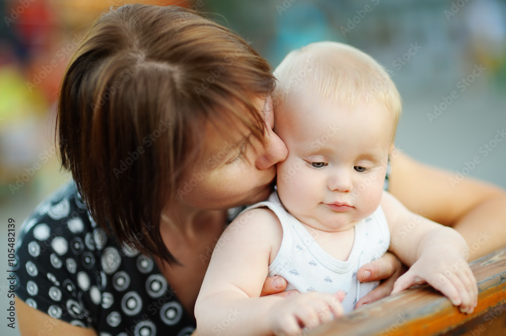 Middle aged woman and her adorable little grandson Middle aged woman and her adorable little grandson