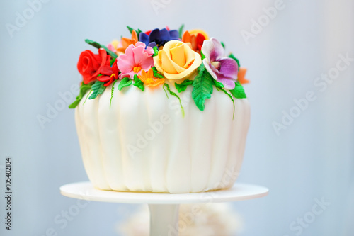 Delicious white wedding or birthday cake