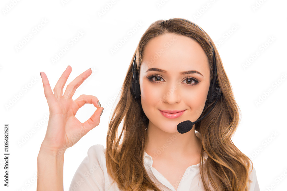 Cheerful young agent of call centre gesturing Cheerful young agent of call centre gesturing