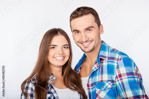 Portrait of happy cute smiling man and woman in love