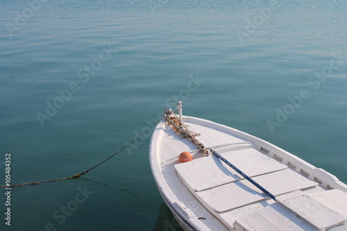 row boat on still sea ocean water calm relax © cheekylorns