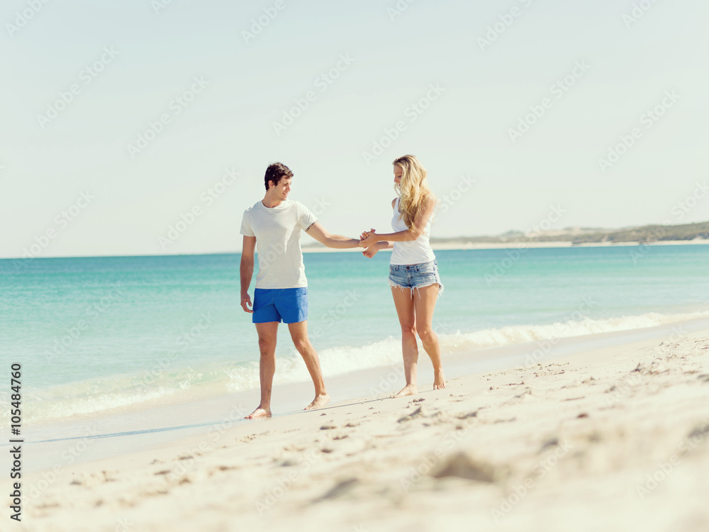 Romantic young couple on the beach Romantic young couple on the beach
