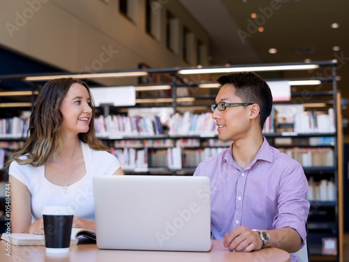 Two young students at the library