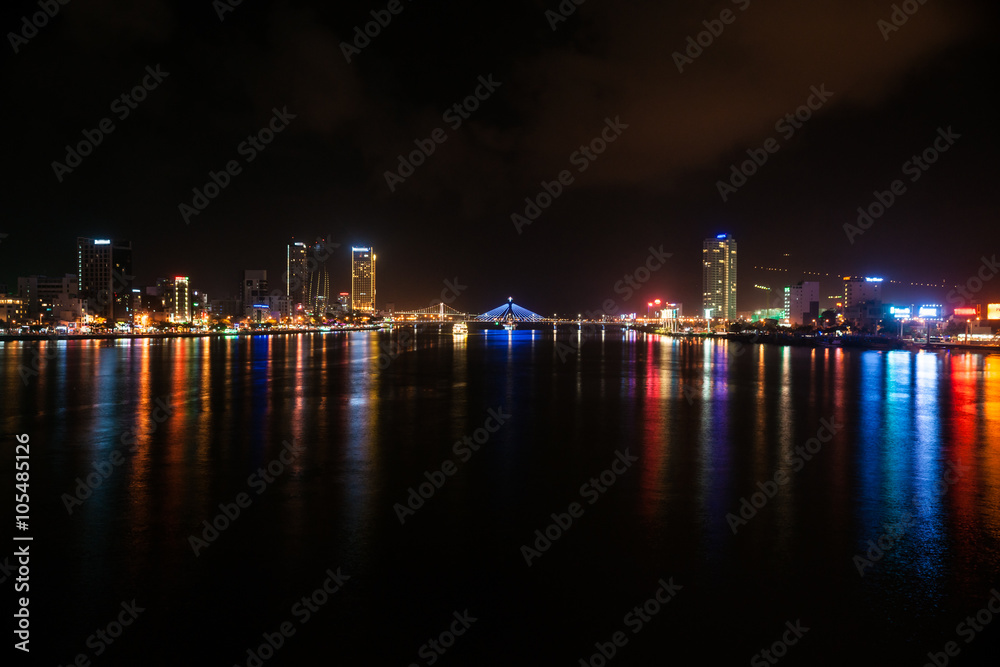 Cityscape of Da Nang city in Vietnam, with night illumination and modern buildings. Cityscape of Da Nang city in Vietnam, with night illumination and modern buildings.