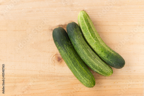 top view of Cucumber on wood background