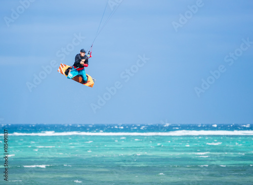 Kiteboarder performing a jump 