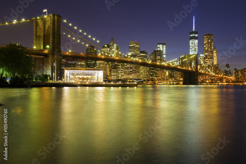 Brooklyn Bridge at dusk viewed from the Brooklyn Bridge Park in New York City.
