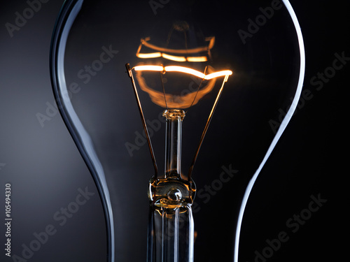 Light bulb over dark background