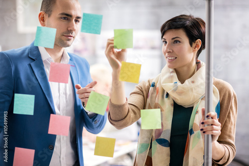 Female designer and collaborator makes business plan