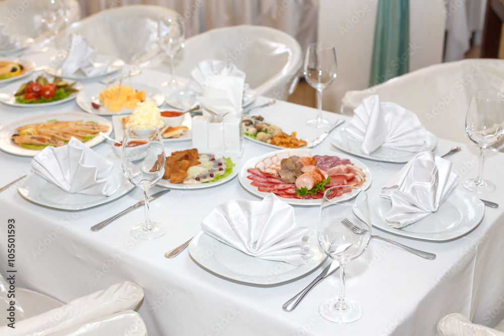 cutlery on the white banquet table