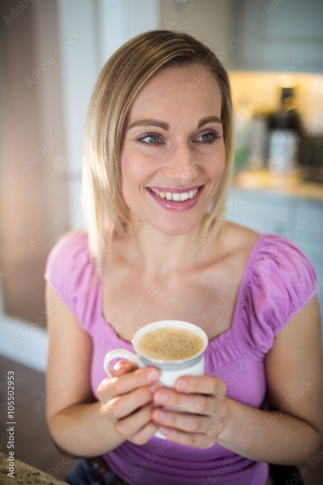 Pretty blonde woman having coffee Pretty blonde woman having coffee