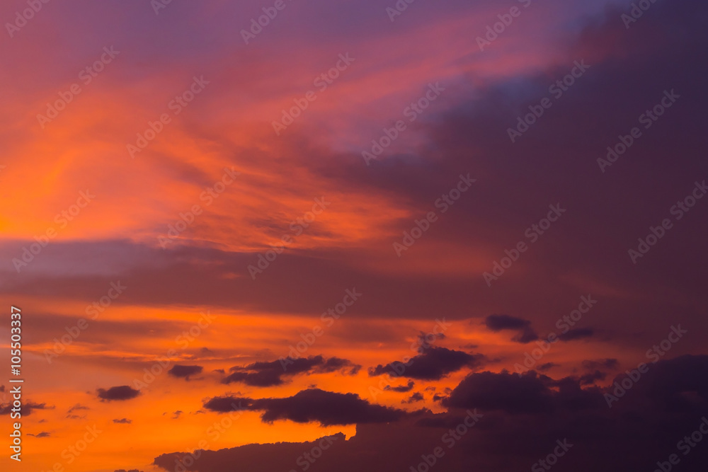 Obraz premium colorful dramatic sunset sky with orange cloud, twilight sky