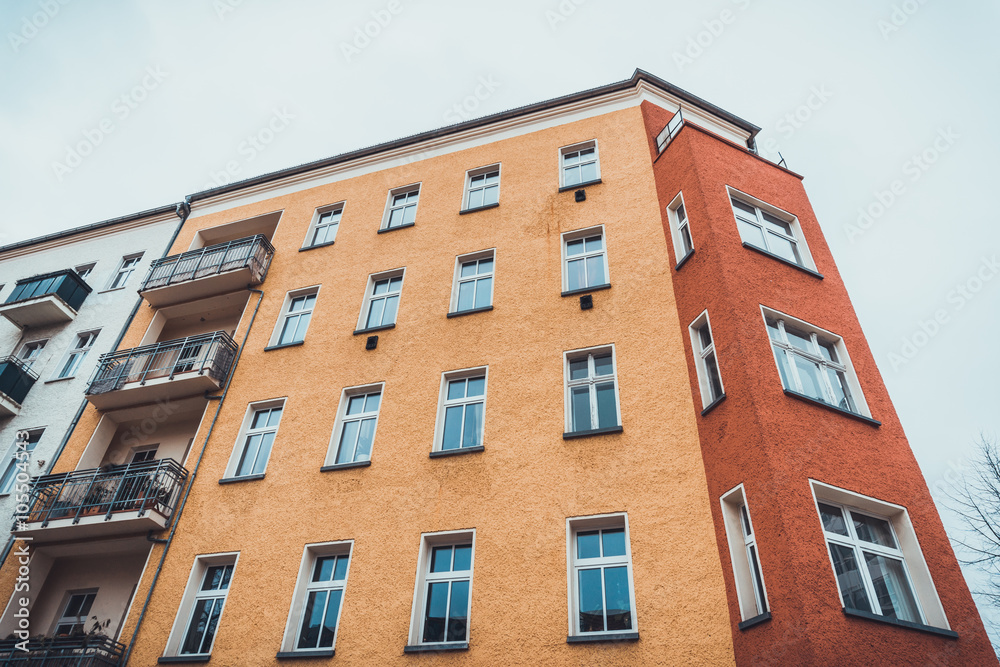 Box type folding windows on brick apartments