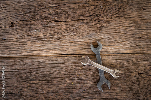 Tools on wooden background.