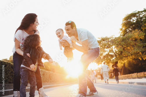 Canvas Print Time for a young happy couple and their children